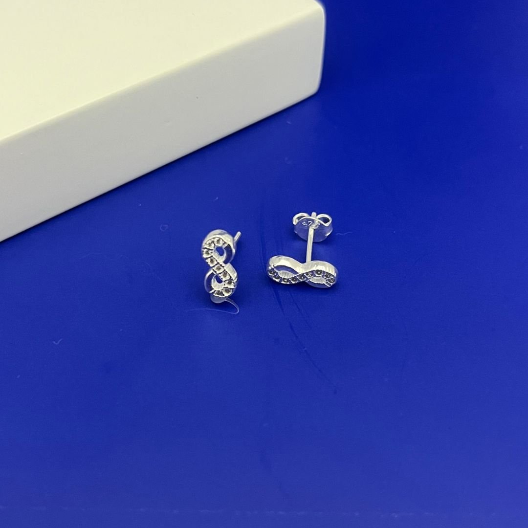 Brinco Infinito Zircônia Cristal Prata 925 | Revenda de Joias Simbólicas